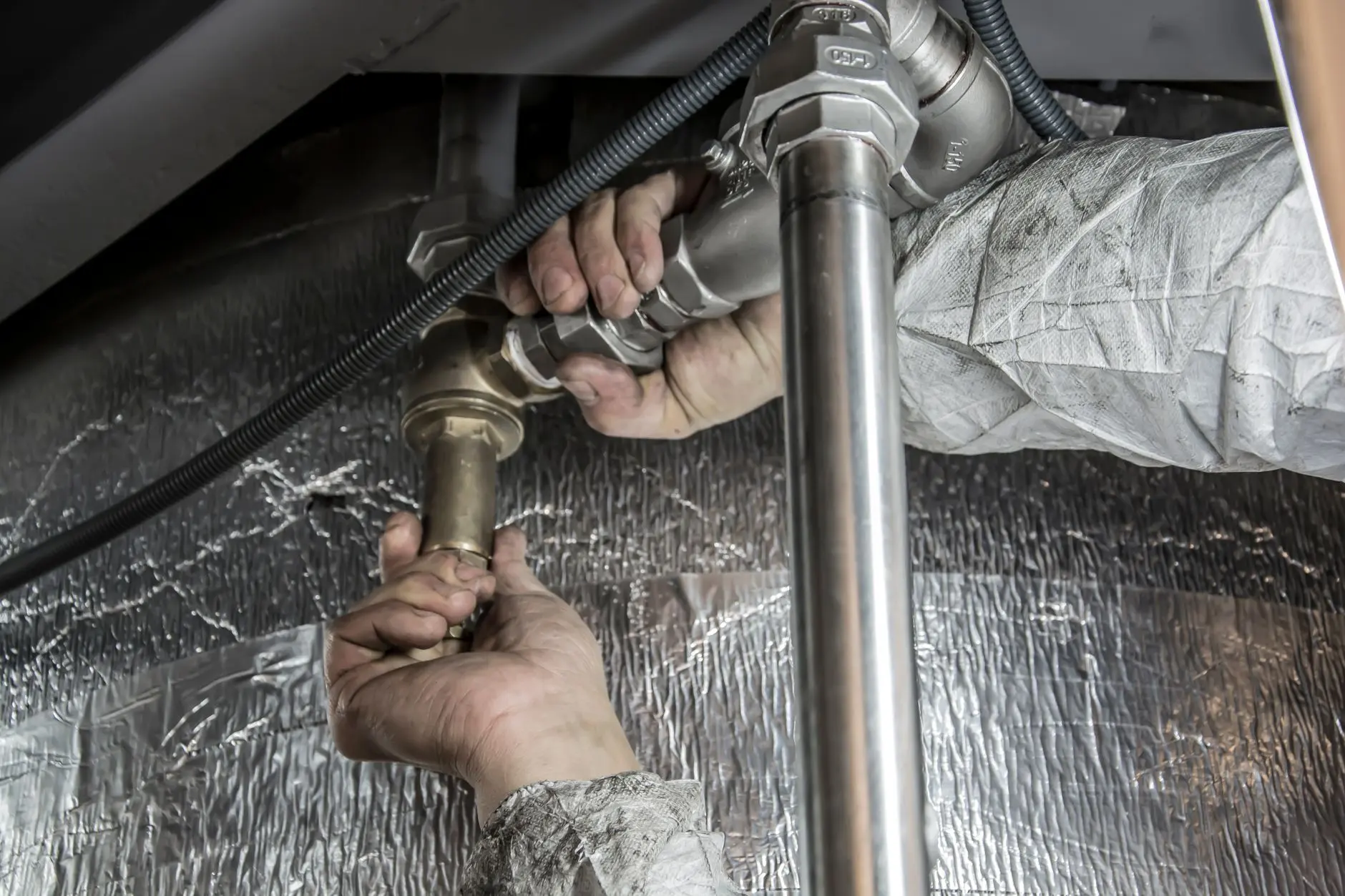 Hollywood emergency plumber working on a residential repair
